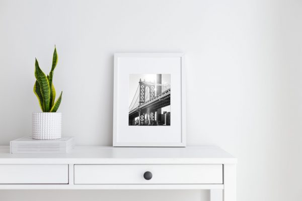 Framed print in an interior setting of the Manhattan Bridge